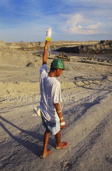 Intraveinous bottle connected, one of ten’s of thousands of Pinatubo’s victims makes his way towards an uncertain future. Porac, Pampanga.